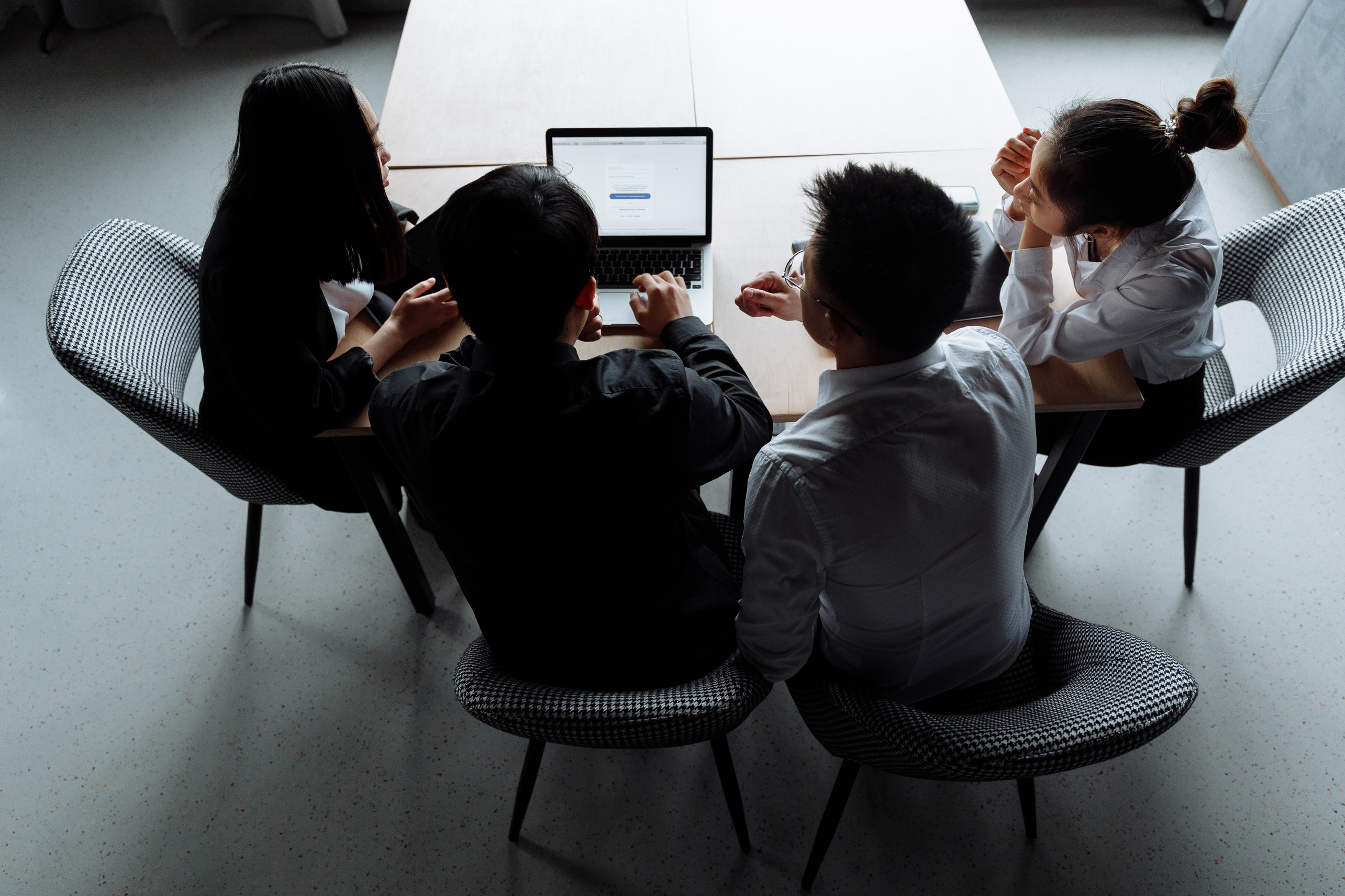 Overhead Shot of a Group of People Having a Meeting